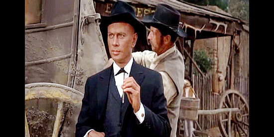 Yul Brynner as Jules Gaspard d'Estaing, arriving for what turns out to be a longer than expected stay in Invitation to a Gunfighter (1964)