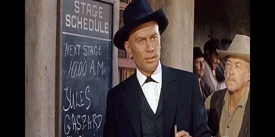 Yul Brynner as Jules Gaspard d'Estaing, teaching a lesson in how to pronounce his name in Invitation to a Gunfighter (1964)