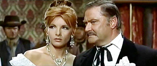 Agnes Spaak as Mrs. Braddock and Antonio Gradoli as her crooked husband Braddock in Death on a High Mountain (1969)