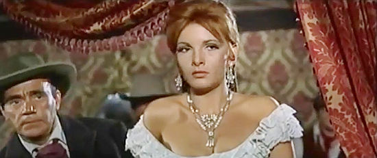 Agnes Spaak as Mrs. Braddock, helping her husband spot impending trouble in Death on a HIgh Mountain (1969)