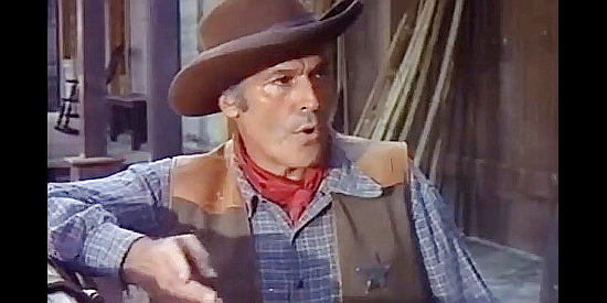 Attilio Dottesio as Bob, the Laredo sheriff wondering what he can do about the drifter named Jones in Challenge of the McKennas (1970)