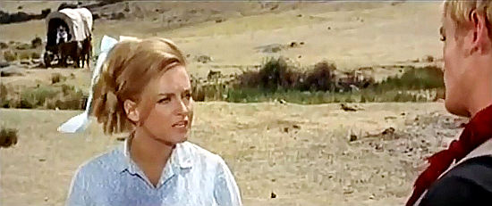 Barbara Carroll as Daphne tries to convince her wilder brother Loring to settle down in Death on a High Mountain (1969)