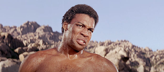 Bernie Casey as Cassie, the explosives expert who joins Chris's latest venture in Guns of the Magnificent Seven (1969)