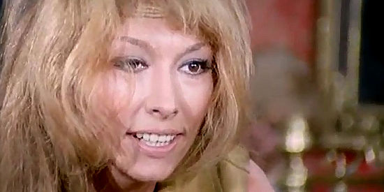 Claudia Gravy as Mary, demanding answers and a share of the gold in Matalo (1970)