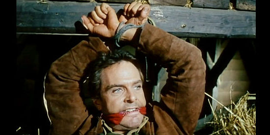 Craig Hill as Will Flaherty finds himself in a jam in Adios Hombre (1967)