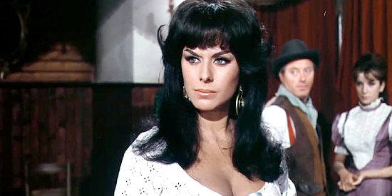 Delores, the saloon girl who captures Guitar's attention in The Last Gun (1964)
