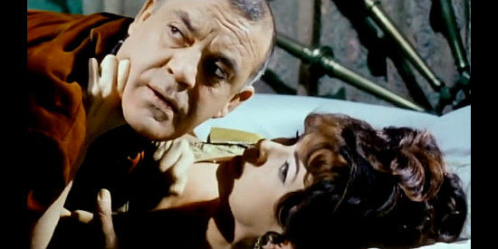 Eduardo Fajardo as Tiny, interrupted while assaulting Peggy (Giulia Rubini) in Adios Hombre (1967)