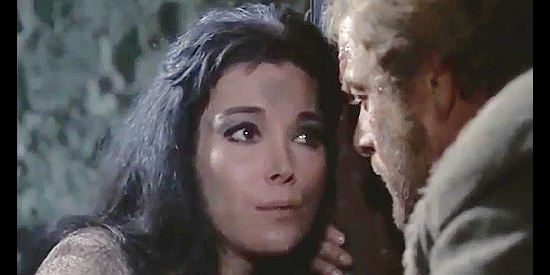 Elisa Montes as Julie, facing a critical moment with Brian Clarke (Gianni Garko) in The Taste of Vengeance (1969)