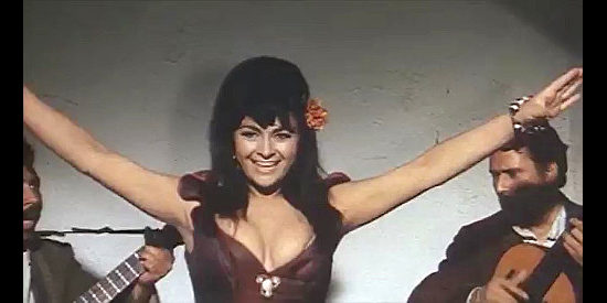 Gabriella Giorgelli as Juanita, does a dance in the cantina in The Beast (1970)