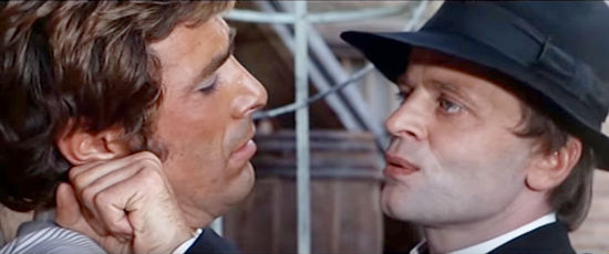 George Hilton as Manolo Sanchez and Klaus Kinski as Blonde have a bit of a disagreement in The Ruthless Four (1967)