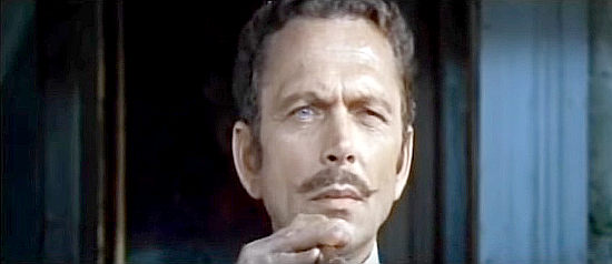 Gerard Herter as Lawrence Blackman, the insurance man after the money in Any Gun Can Play (1967)