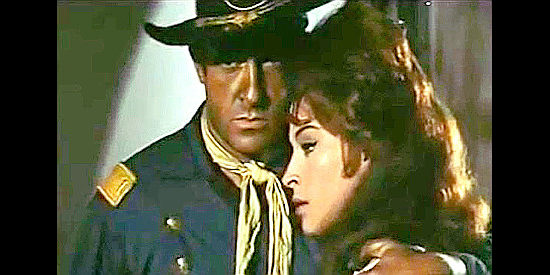 German Cobos as Capt. Richard O'Hara with Marta Padovan as Mary McQueen at the Apache attack intensifies  in The Secret of Captain O'Hara (1968)