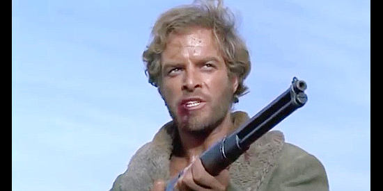 Gianni Garko as Brian Clarke, with a gun aimed at former friend Daniel in The Taste of Vengeance (1969)