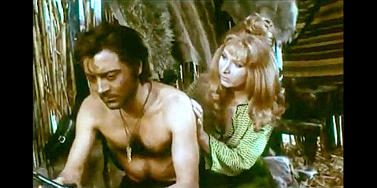 Gianni Medici (John Hamilton) under the care of Sandy Baker (Conny Caracciolo) after being whipped by Maj. Bower's men in Vengeance for Vengeance (1968)
