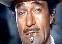 Gilbert Roland as Montero, the bandit who steals, then loses $300,000 in Any Gun Can Play (1967)