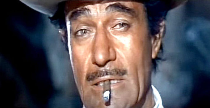 Gilbert Roland as Montero, the bandit who steals, then loses $300,000 in Any Gun Can Play (1967)