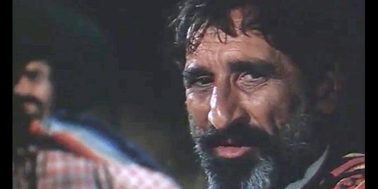 Giovanni Pallavicino as Machete, tells a hostage how he got his name in The Beast (1970)