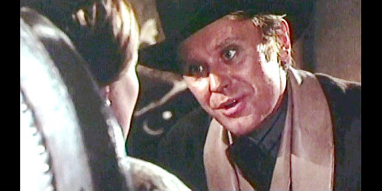 Horst Frank as Jason Forrester threatens Regina not to spill her secrets in The Moment to Kill (1968)