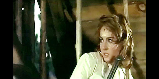 Iran Eory as Gwen Burnett, fearful of being kidnapped by the Apaches a second time in Man from the Cursed Valley (1964)