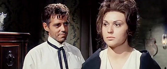 Jack Betts (Hunt Powers) as Sugar Colt, trying to win the confidence of saloon owner Bess (Gina Rovere ) in Sugar Colt (1966)