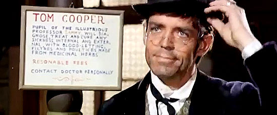 Jack Betts (Hunt Powers) introducing himself to the folks of Snake Valley as Dr. Tom Cooper in Sugar Colt (1966)