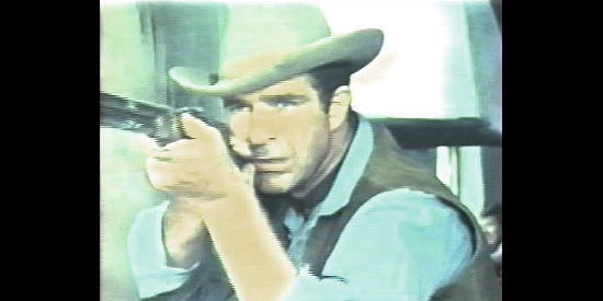 James Philbrook as Sam Foster, helping fend off an Indian attack in Ballad of a Bounty Hunter (1966)