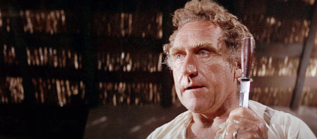 James Whitmore as Levi Morgan, the knife expert who joins the seven in Guns of the Magnificent Seven (1969)