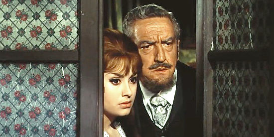 Janet and the town doctor watching the final showdown in The Last Gun (1964)
