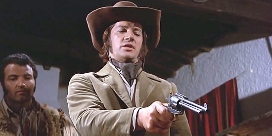 Jeff Cameron as Django, with a member of the Cortez gang underr his gun in Even Django Has His Price (1971)