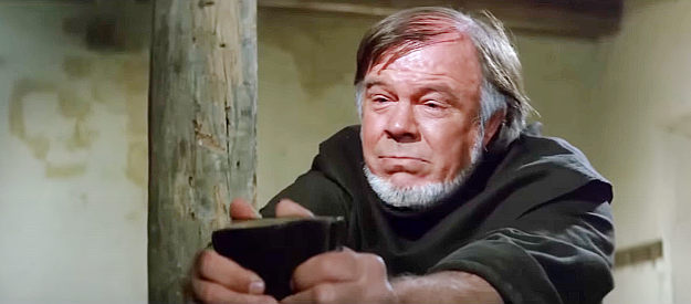 Jess Hahn as Father Rodriguez in Captain Apache (1971)