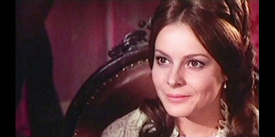 Loni von Friedl as Regina, the wheelchair bound woman with the key to a missing $500,000 in The Moment to Kill (1968)