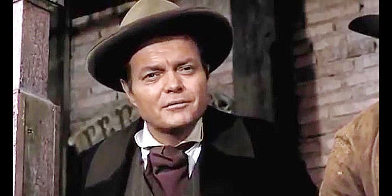 Luciano Pigozzi (Alan Collins) as Bill Perkins, at odds with the new Fort City sheriff in The Taste of Vengeance (1969)