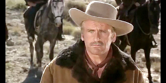 Luis Induni as Tom, foreman on the Blake ranch, about to face a showdown with Brian Clarke in The Taste of Vengeance (1969)