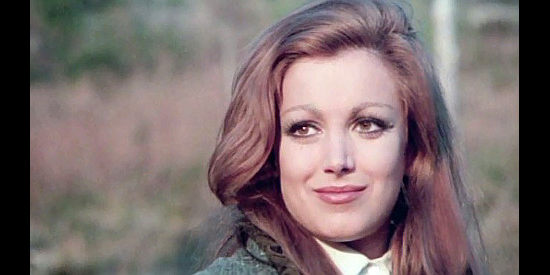 Maria Pia Conte as Susan, a young woman who finds herself falling for Dan Barker in spite of his past in And the Crows Will Dig Your Grave (1972)