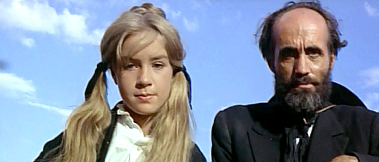 Maribel Martin as Little Sarah and Herman Reynoso as the Mormon leader in The Big Gundown (1966)