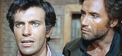 Mark Damon as Johnny Lassiter and Anthony Steffen as Fed Dalton in Dead Men Don't Count (1968)