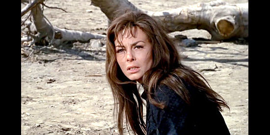 Michele Mercier as Maria Caine, mourning a dead husband in Cemetery Without Crosses (1969)