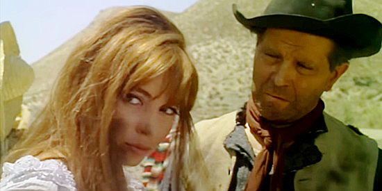 Nuria Torray as Mary Patterson with Uncle Jeremy (Antonio Moreno) after her home is burned to the ground in Ballad of a Bounty Hunter (1966)