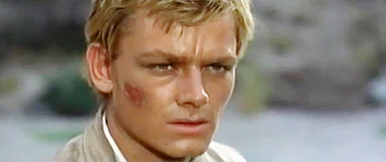 Peter Lee Lawrence as Loring Vanderbilt, showing the effects of a barroom brawl in Death on a High Mountain (1969)