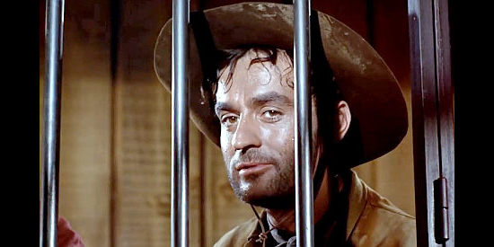 Pierre Hatet as Frank Rogers, one of Rogers' sons in Cemetery Without Crosses (1969)