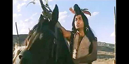 Rafael Albaicin as Flaming Arrow, ordering an Apache attack on the fort  in The Secret of Captain O'Hara (1968)