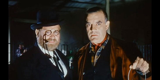 Robert Camardiel as Doc and Eduardo Fajardo as Tiny eye up a bank vault in Adios Hombre (1967)