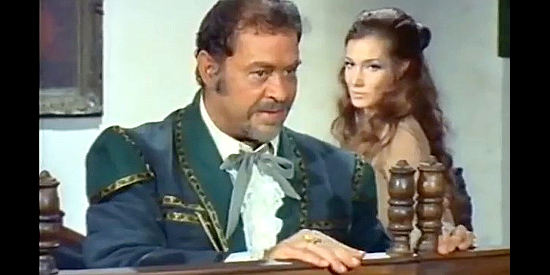 Roberto Camardiel as Don Diego, discussing the past with former lover Maggie (Annabella Incontrera as Pam Stevenson) in Challenge of the McKennas (1970)