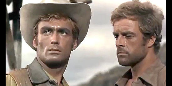 Roberto Miali (Jerry Wilson), wondering whether to follow his brother or Brian Clarke (Gianni Garko, right) in The Taste of Vengeance (1969)