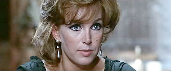 Sarah Ross as Annie issues a warning to Sam Cooper in The Ruthless Four (1967)