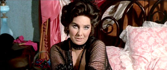 Serena Michelotti as Madame Warren in It Can Be Done Amigo (1972)
