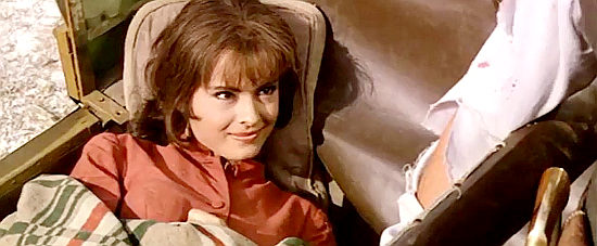 Soledad Miranda as Josephine finds a comfy spot in a buckboard in Sugar Colt (1966)