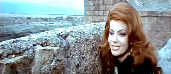 Stefania Careddu as Guapa, preparing to help attrack the gold train in Any Gun Can Play (1967)