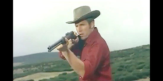 Ty Hardin as Jhnny Walscott, about to interrupt a showdown between an Apache and Torito in Man from the Cursed Valley (1964)