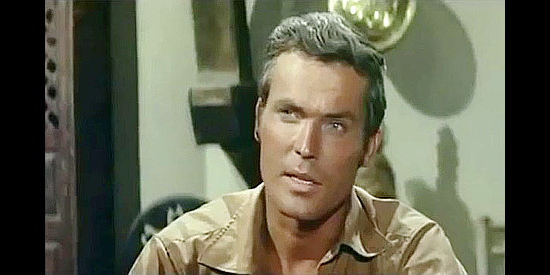 Ty Hardin as Johnny Walscott, hoping of bringing Gwen and her prejudiced father together in Man from the Cursed Valley (1964)